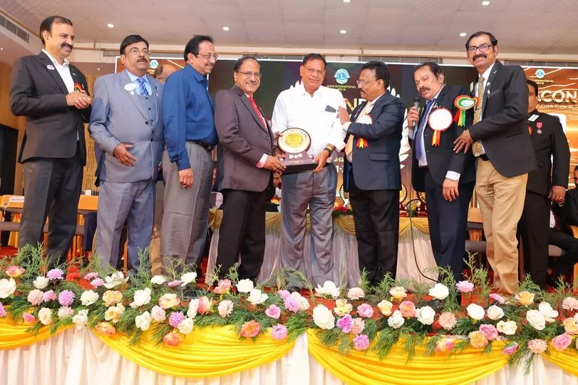 Photo of Lions Club award for most distinguished service awarded to Johnson Kolankanni in the presence of Lion James Valappila PMJF